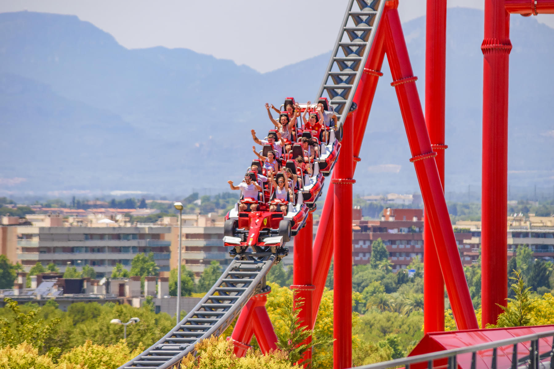 Sit on the thrilling roller-coaster ride of Formula Rossa