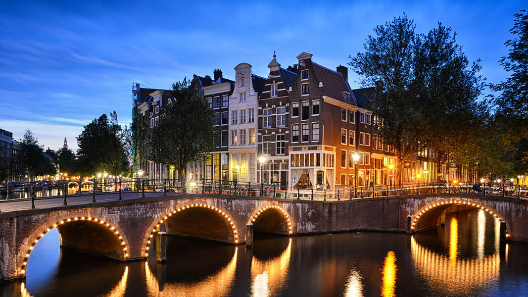 Get amazed by the night view of Amsterdam