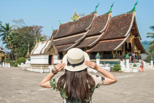 Visit the Wat Xieng Thong, an iconic temple in Luang Prabang