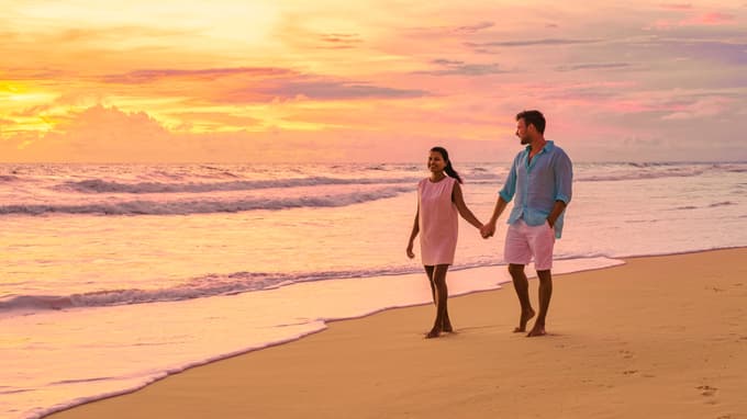 Couple strolling at the Alleppey beach