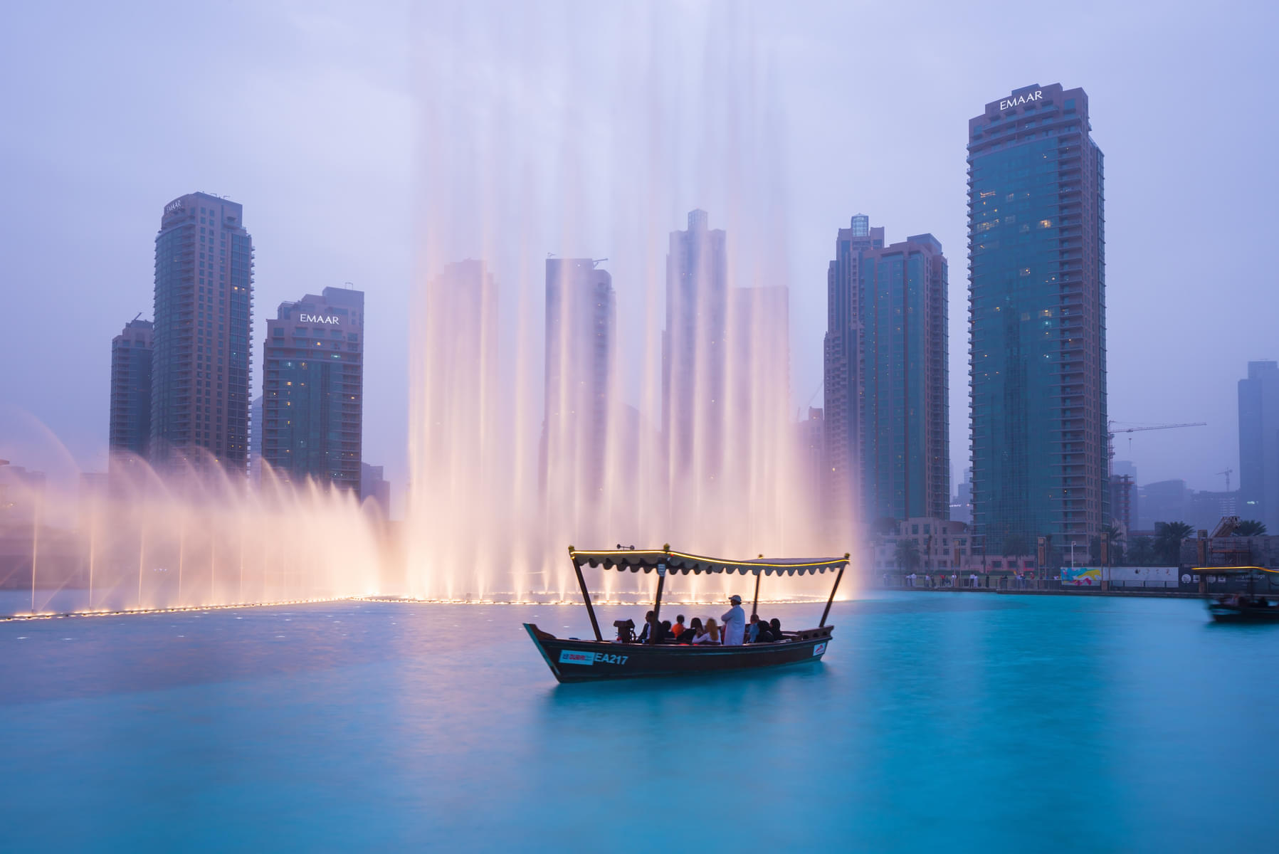 Embark on a cultural journey with a serene traditional Abra ride.