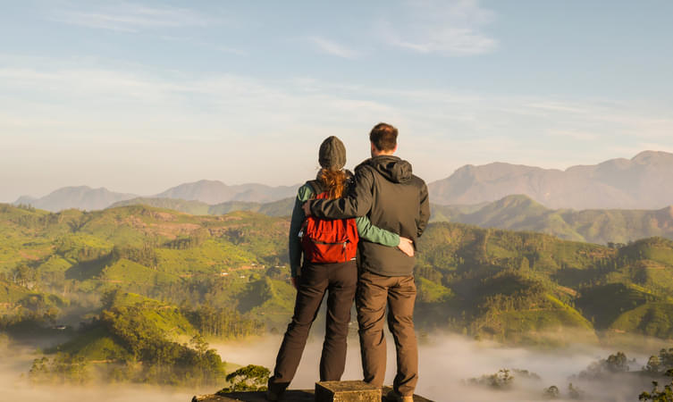 Couple admiring the beauty of Munnar