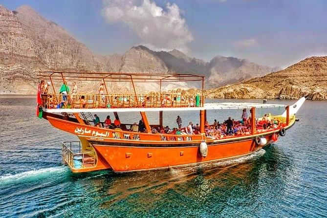 Board the traditional Omani Dhow