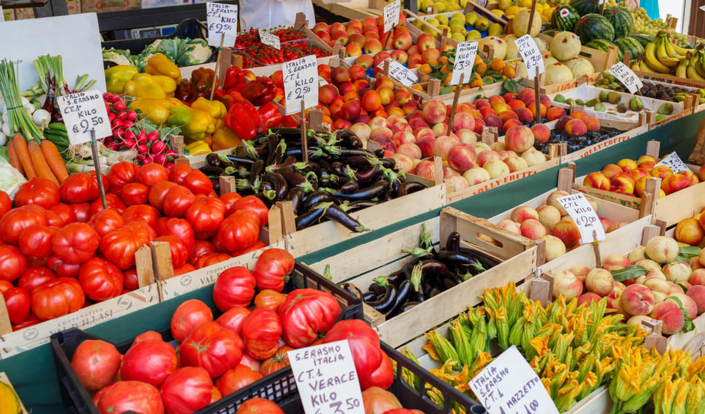See the amazing variety of fruits and vegetables at the Rialto Market