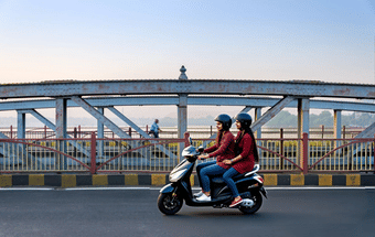 Glide effortlessly across Ellis Bridge admiring the stunning city views