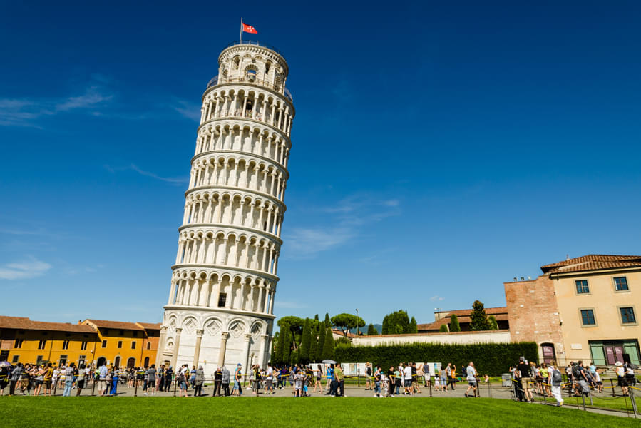 See the Leaning Tower of Pisa which is 57 meters in height