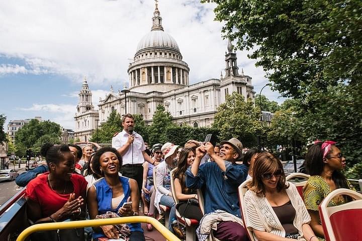 Enjoy the London City tour in open-top vintage 1960s Routemaster bus