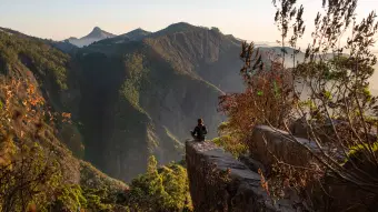 Sit atop the iconic Dolphin’s Nose rock formation and admire the panoramic views of the lush valleys and distant mountains