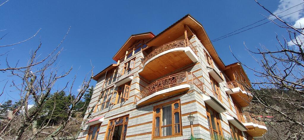 A Riverside Cottage Stay Amidst Lush Greenery In Manali Image
