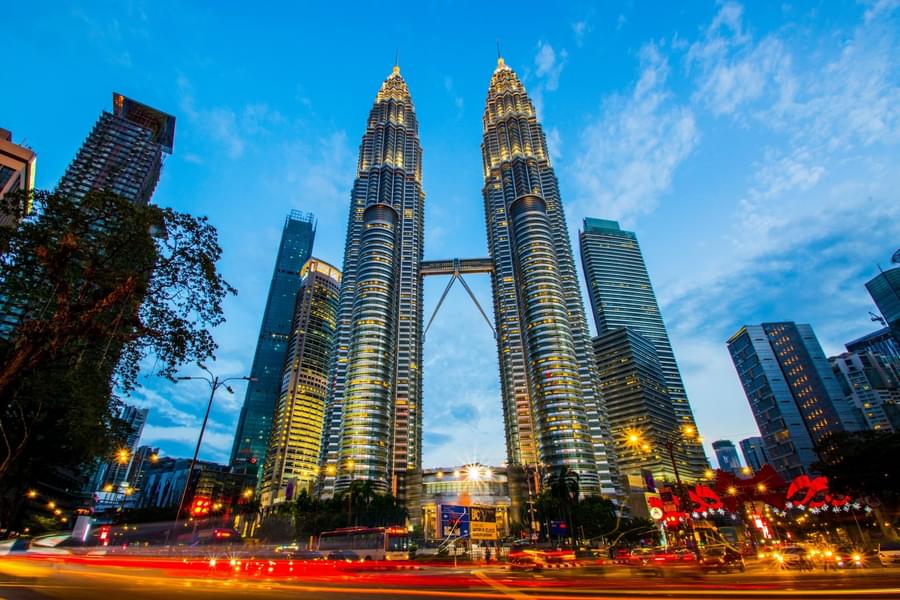 Marvel at the shimmering beauty of the Petronas Twin Towers