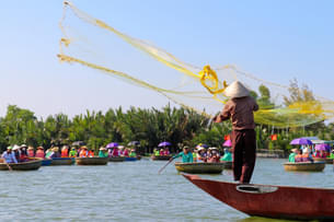 Watch the fishermen getting a bountiful catch while gliding through tranquil waters on a traditional coconut boat