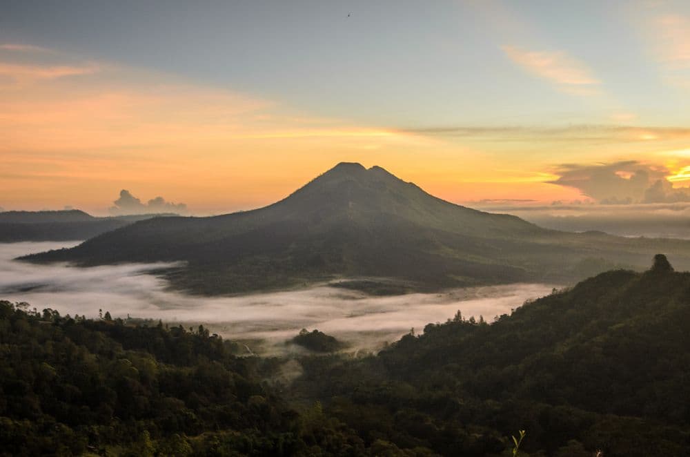 Sunrise panorama from Mount Batur volcano summit Bali