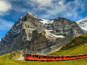 Pass through the scenic routes while riding on classic cogwheel train