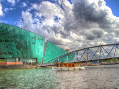 Beautiful view of the Nemo Science museum with the IJ river car tunnel.