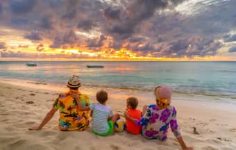 Family spending time at a beach in Mauritius