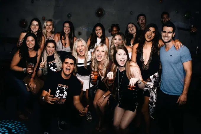 Cheers beer, wine, absinthe, and vodka with your friends