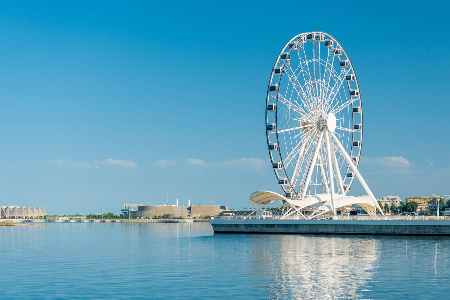Baku Ferris Wheel on the waterfront, a highlight of Azerbaijan tour packages.