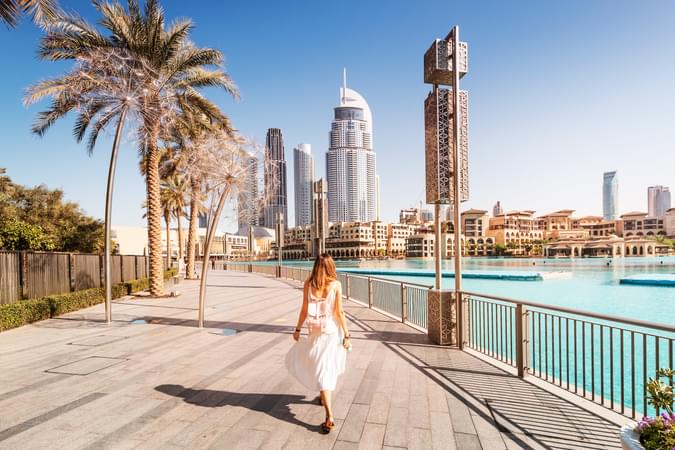 Girl enjoying the panoramic views of the Dubai City, Dubai