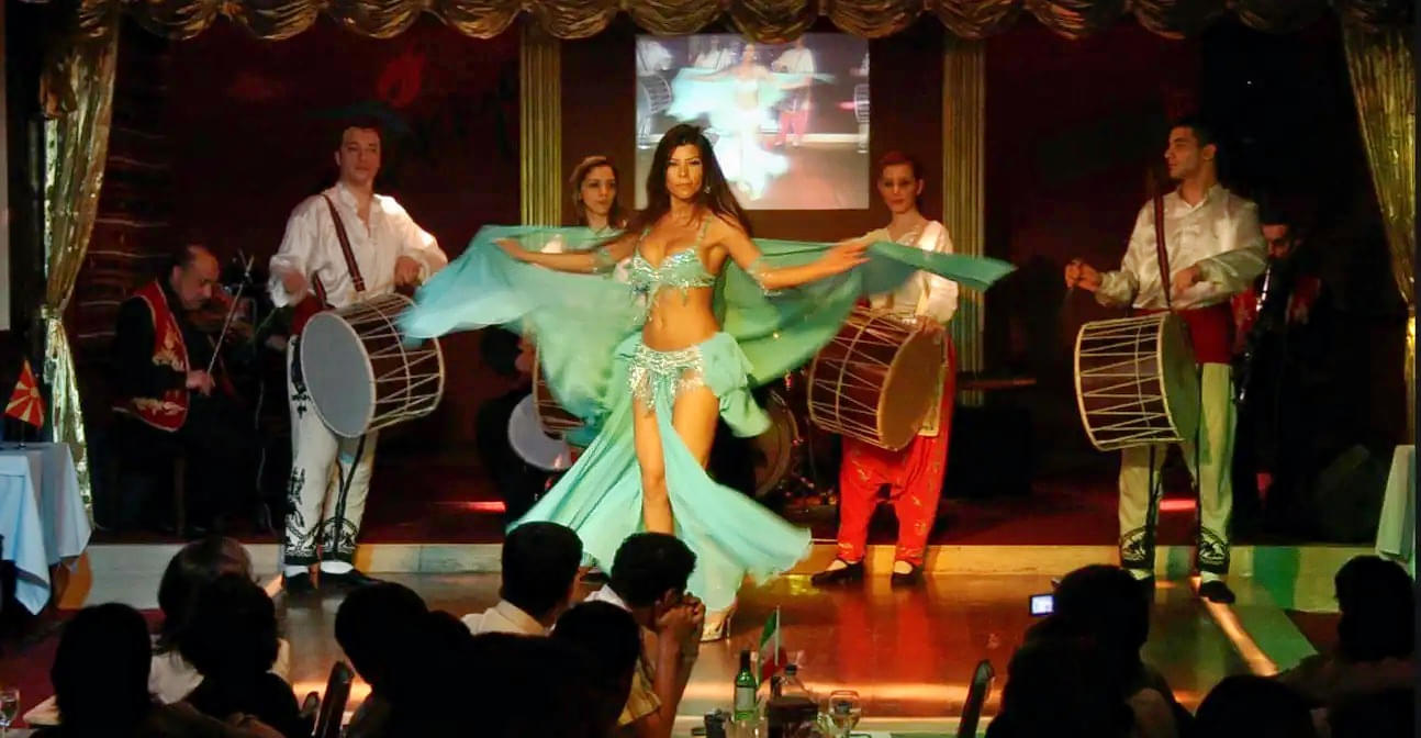 Experience dance alongside a belly dancer