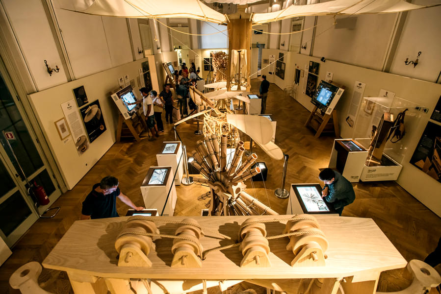 Marvel at the models of various machines invented by Vinci