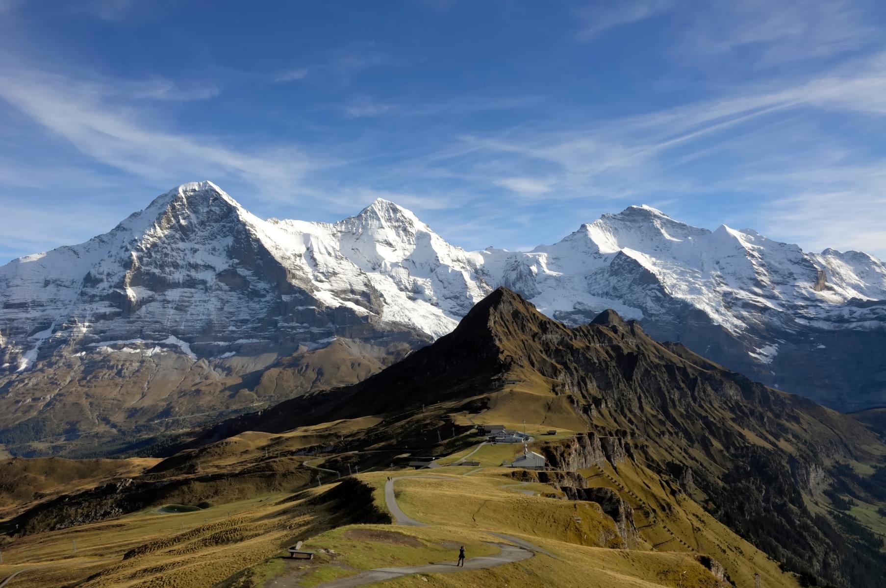Admire the majestic Eiger, Mönch, and Jungfrau peaks in all their glory
