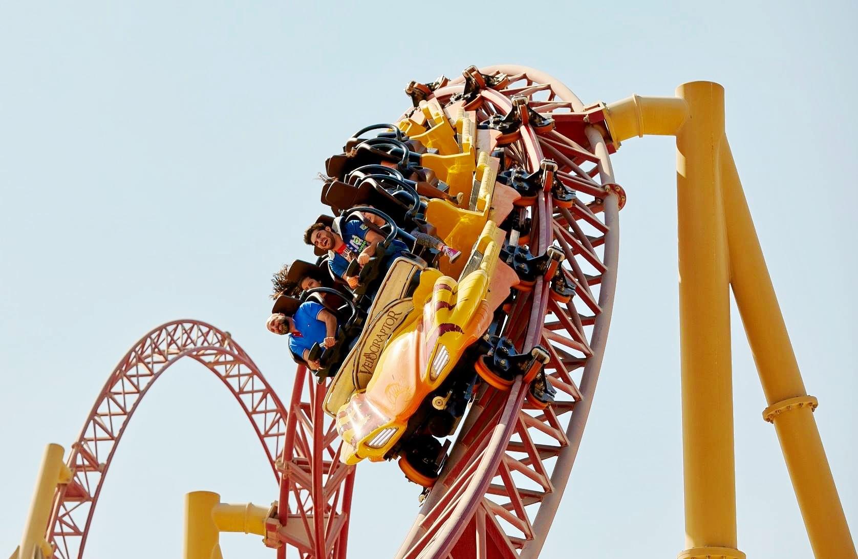 Experience the thrill of a lifetime on a roller coaster at the theme park