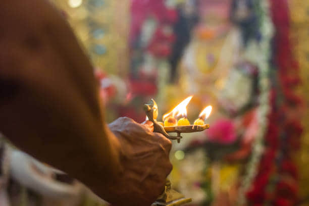 Attend the Daily Aartis and Bhajans