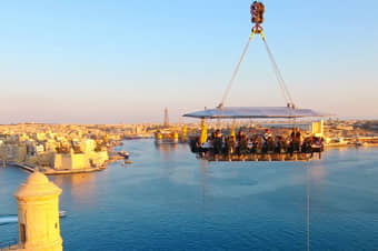 Relish world class cuisines while floating 50 meters above the ground