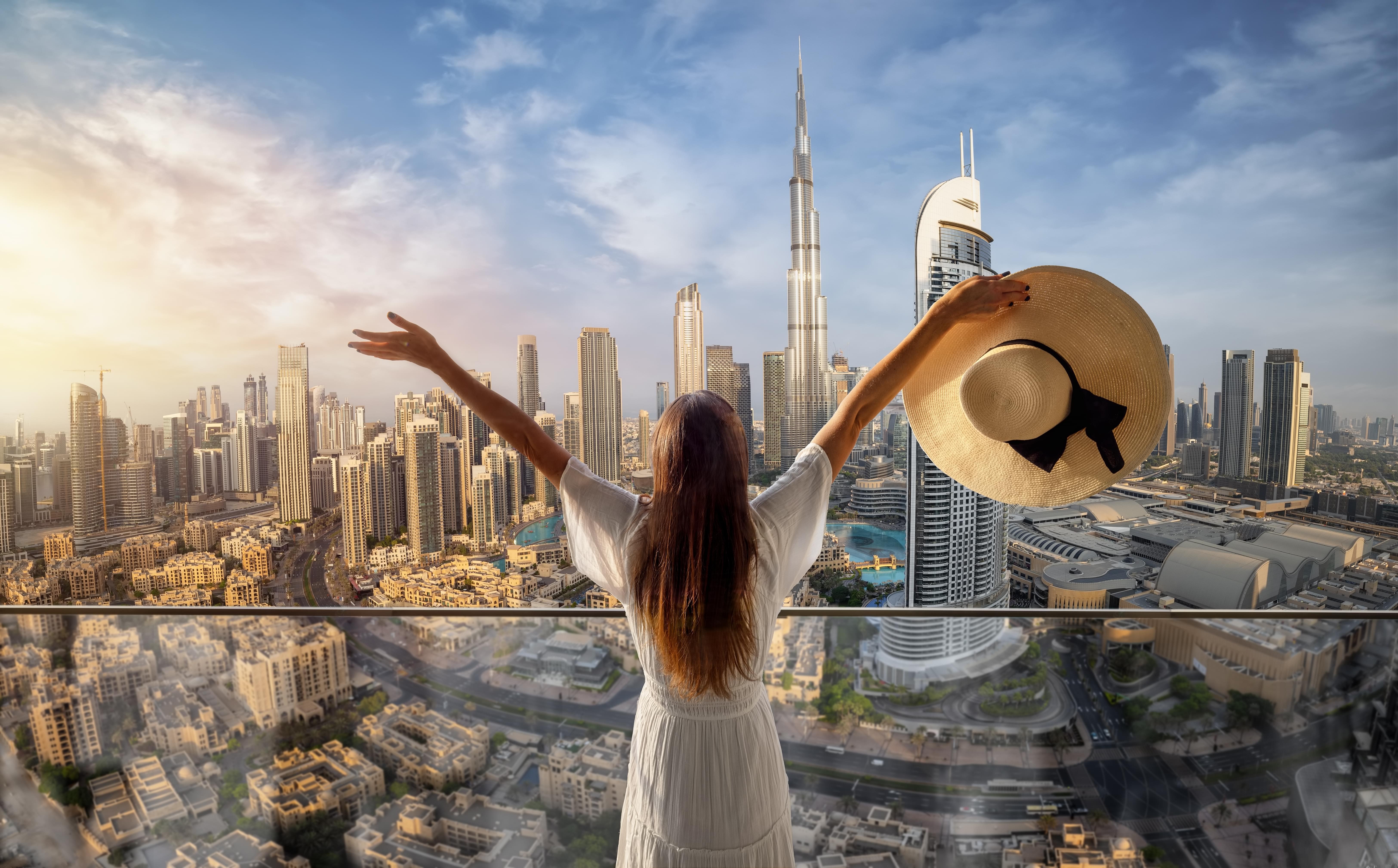 Tourist enjoying skyline of Dubai