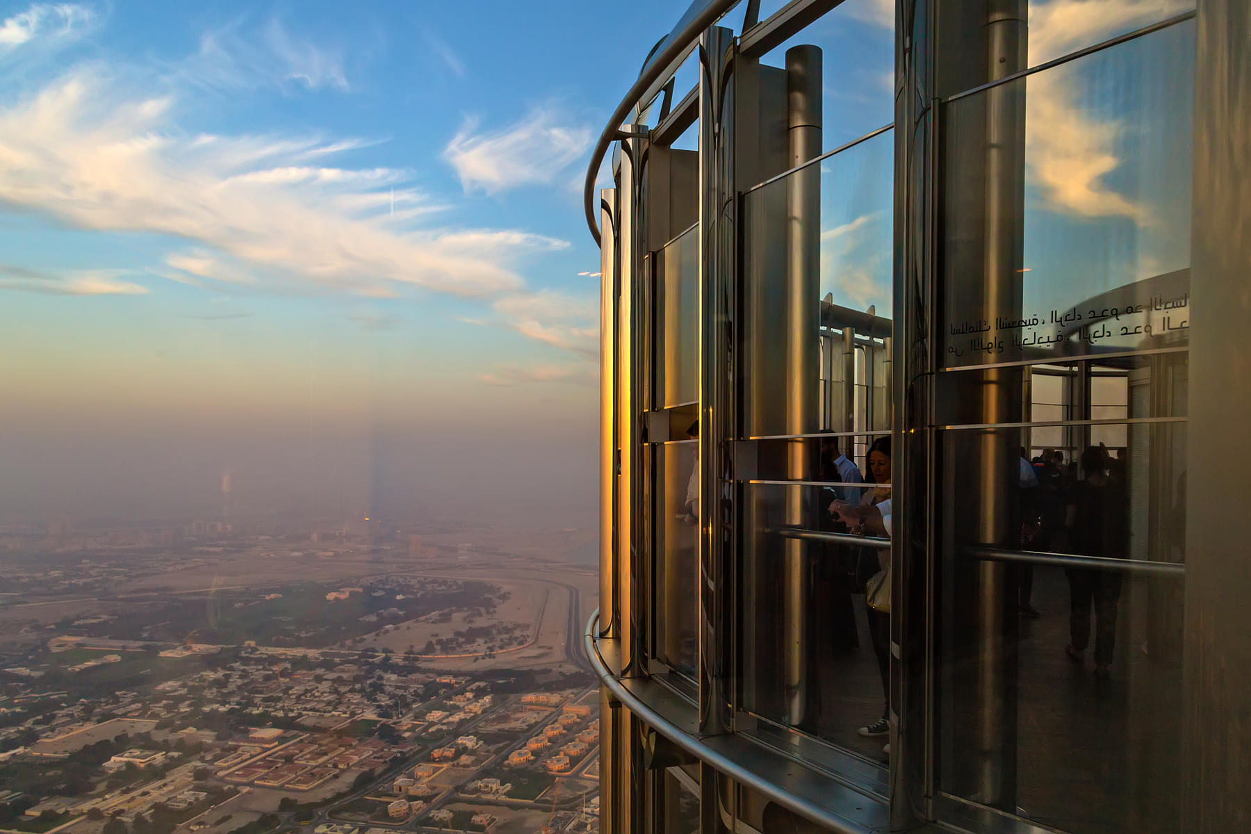 See what Dubai city looks like from floor to ceiling windows of 124th floor of Burj Khalifa
