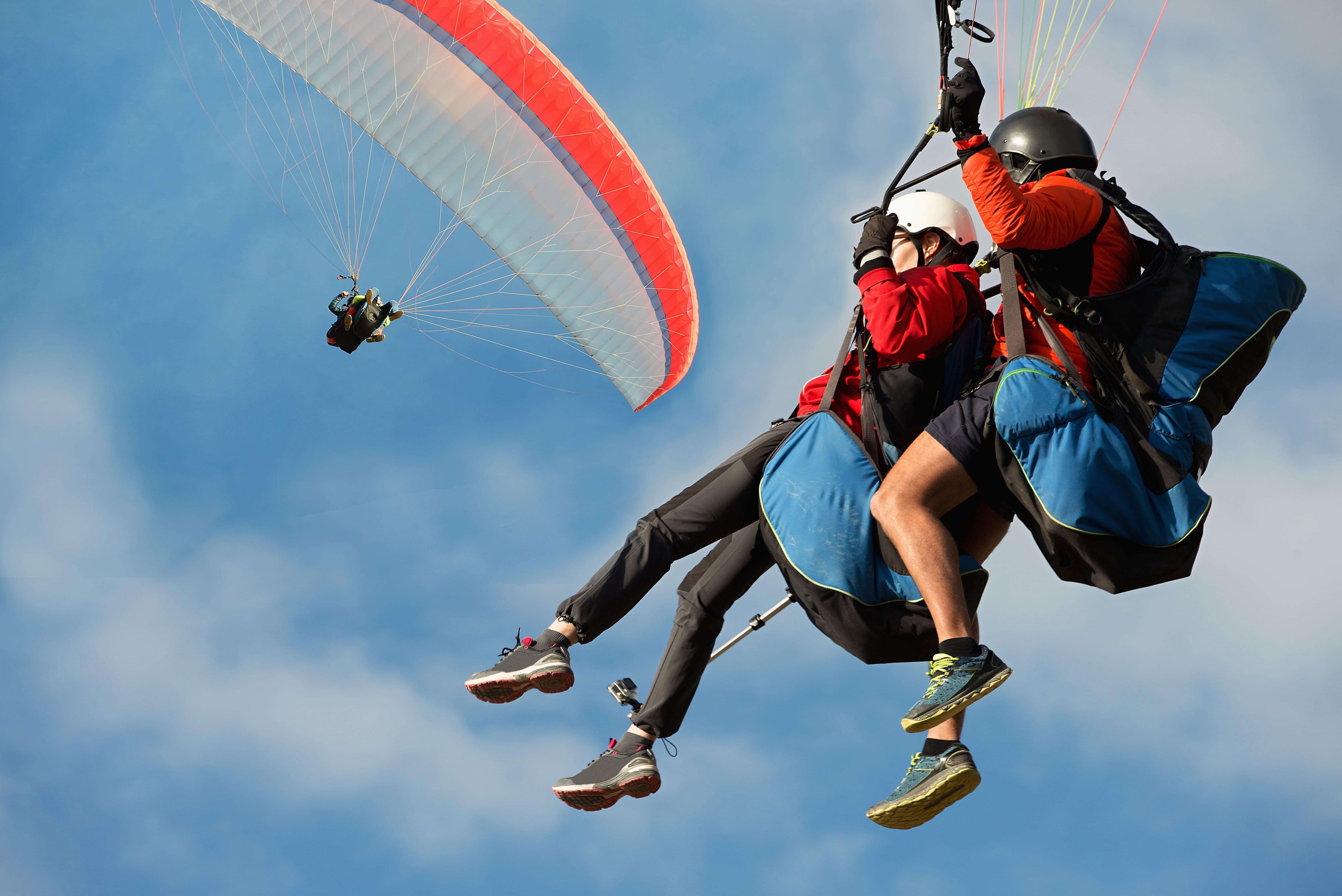 Two Person paragliding in interlaken.jpg