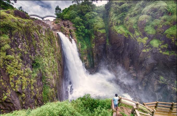 Feel the mist near the dramatic Weinia Waterfall plunge
