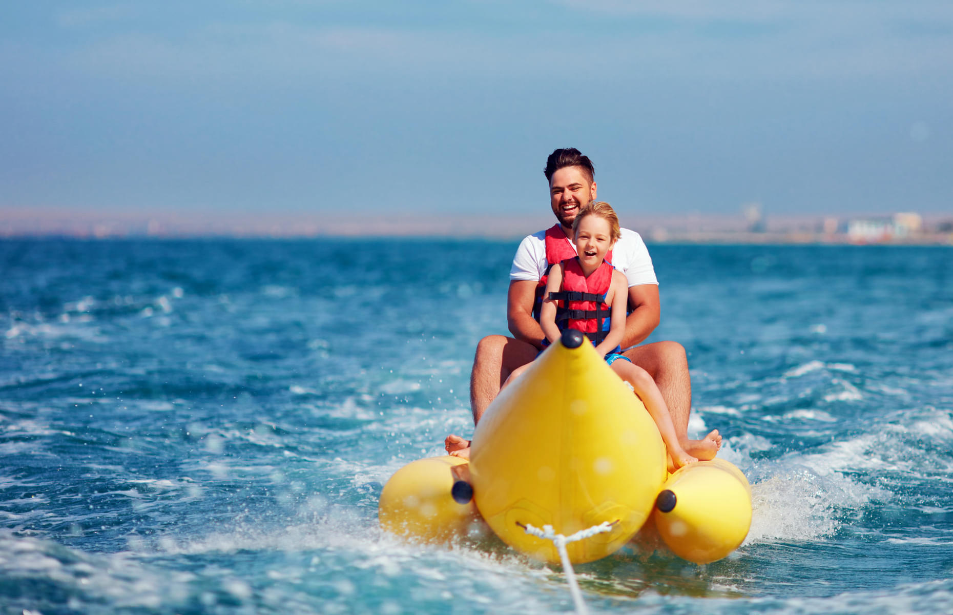 The excitement of being on an inflatable banana shaped boat