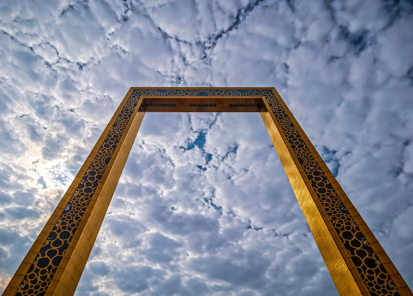 Capture the stunning Dubai Frame with cloud views