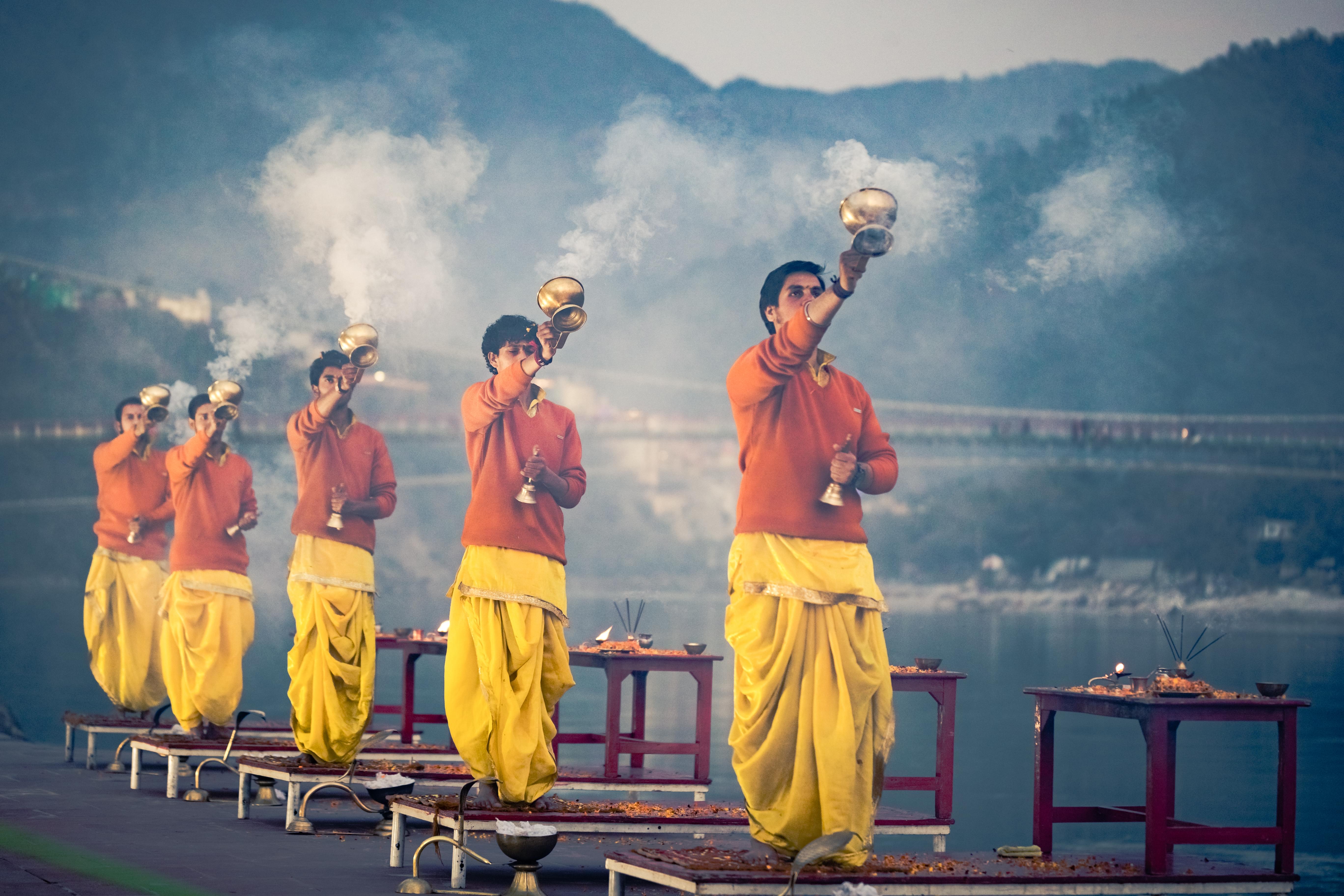 Priests doing Ganga Aarti at Triveni ghat, Rishikesh