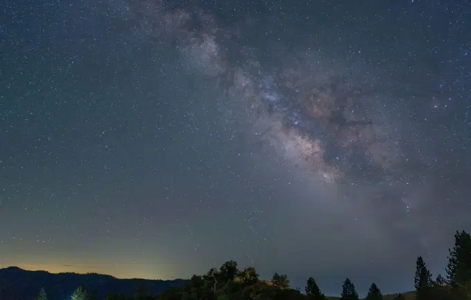 Feel the magic of the jungle night as wildlife sounds complement your stargazing