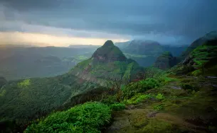 Admire the lush green valleys and hills of Mahabaleshwar, a hill station in Maharashtra