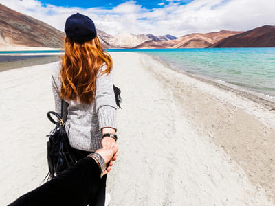 Explore the Pangong Lake which is world's highest saltwater lake with your lady luck