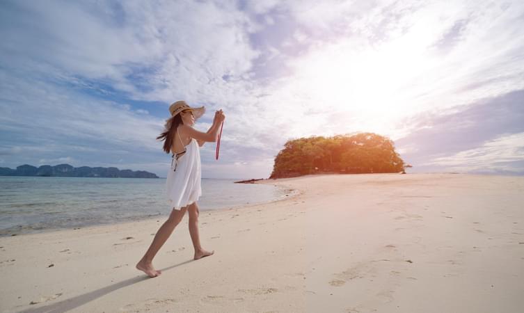 Woman wandering at a beach in Andaman