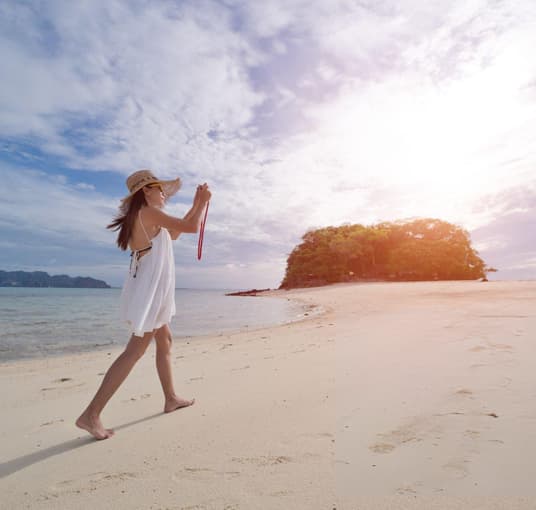 Woman wandering at a beach in Andaman