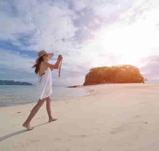 Woman wandering at a beach in Andaman