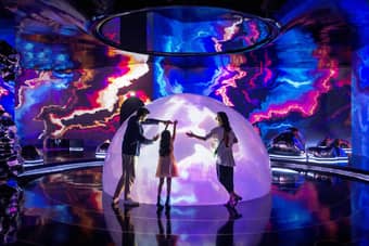 Family exploring inside AYA Universe