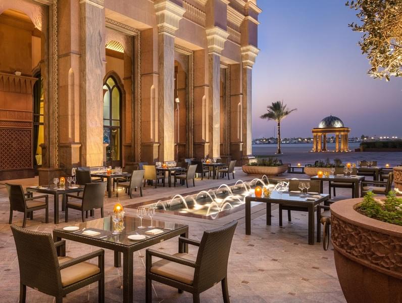 Unwind at the outdoor cafeteria, while surrounded by the lavish beauty of the Emirates Palace