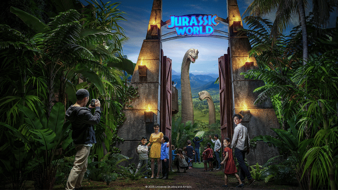 Walk through the iconic Jurassic World gates and step into the heart of Isla Nublar