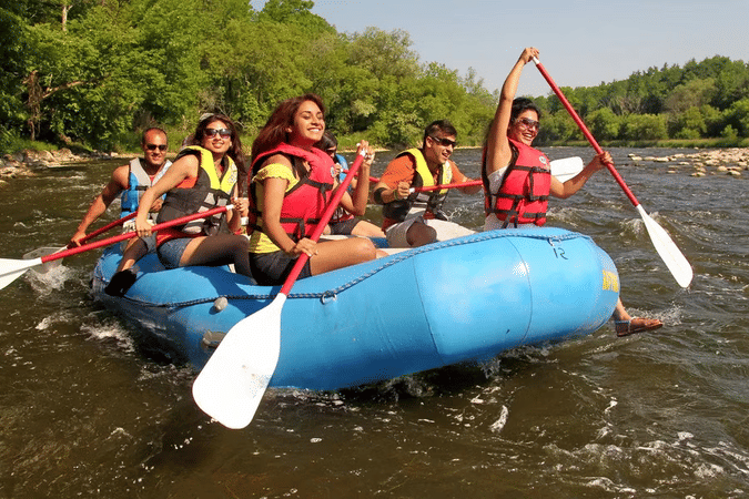 Go on a guided rafting adventure on the Kundalika River, navigating thrilling rapids
