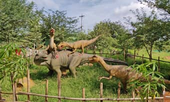 Explore realistic dinosaur replicas at Dino World for a prehistoric adventure