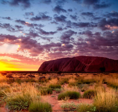 Admire the vast beauty of Uluru-Kata Tjuta National Park.