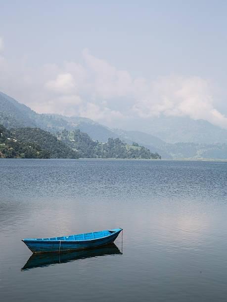 Paddleboat across the emerald waters for peaceful lake views