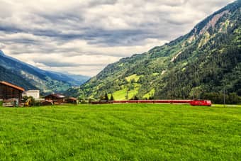 The Glacier Express traveling through the alps
