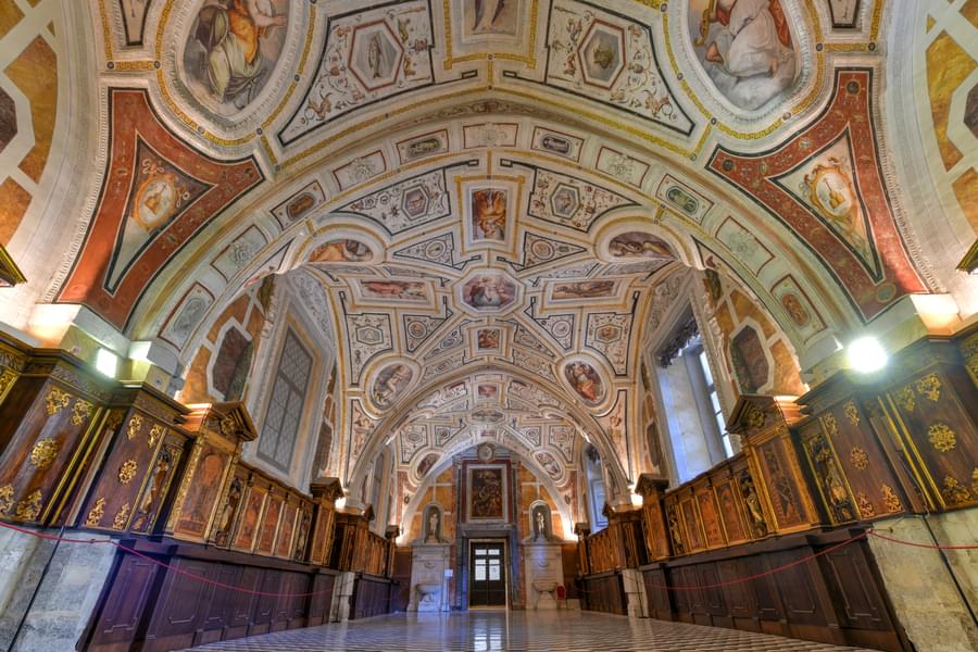 Admire the beautiful frescoed ceilings